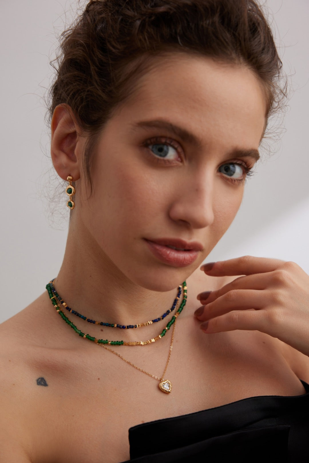 Collana con moneta di smeraldo