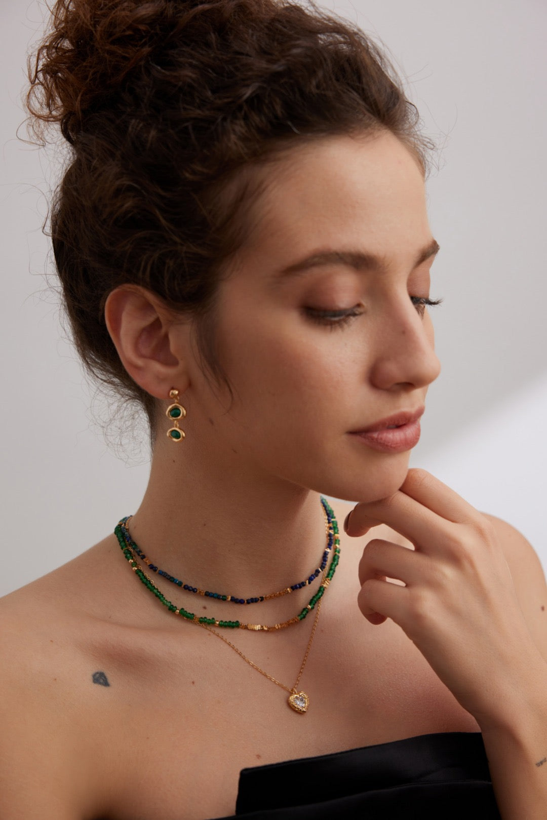 Collana con moneta di smeraldo