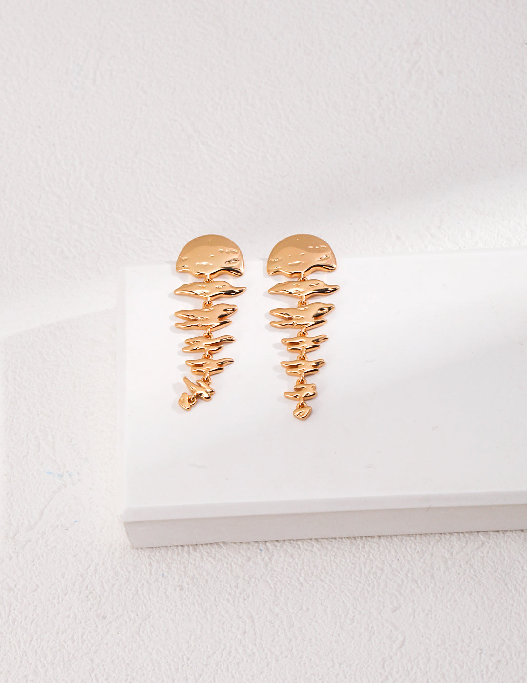Boucles d'oreilles reflets ondulants