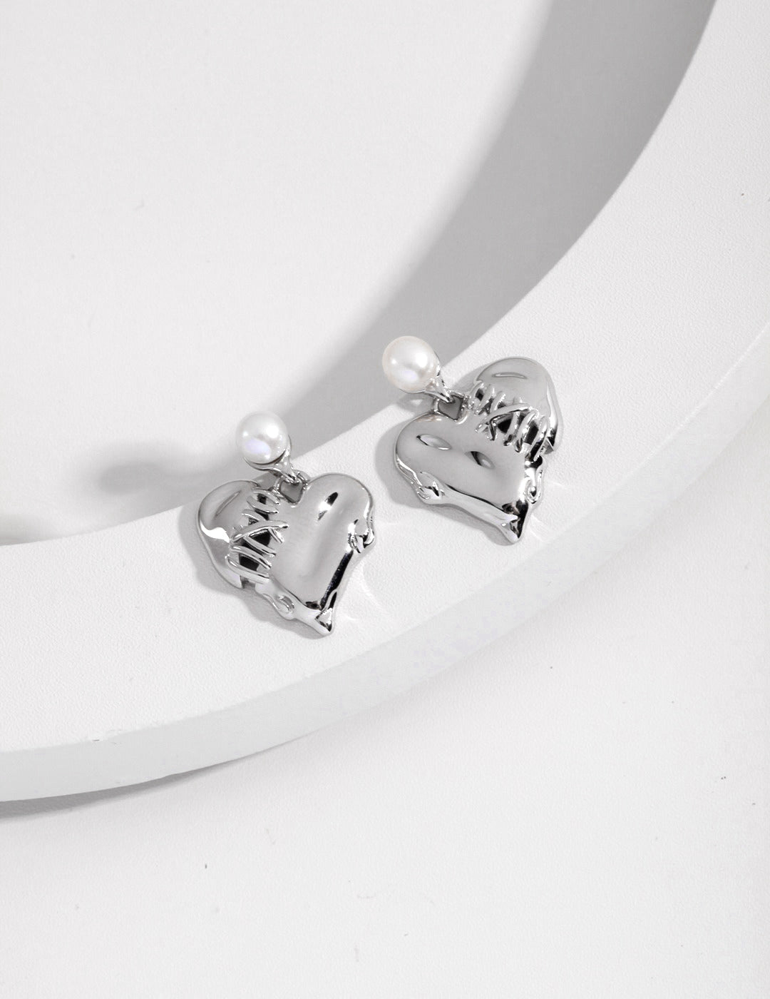 Boucles d'oreilles Cœur blessé